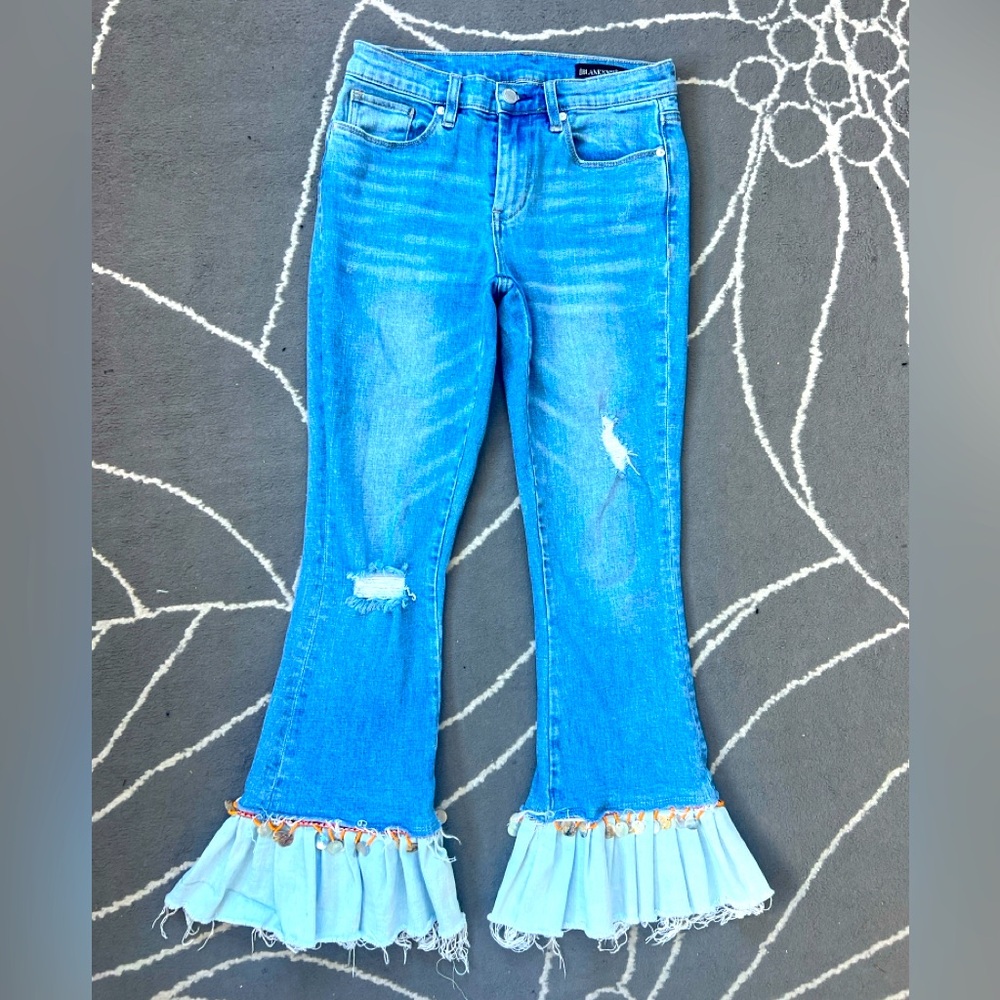 Blank NYC Vibrant Blue Flare ruffle Jeans with Distressing and Fringe Detail